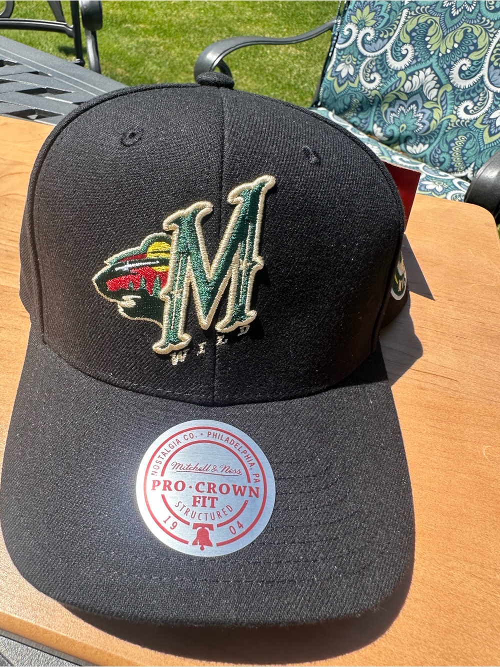 Mitchell & Ness Black Cap with Green and Cream 'M' Logo and Multicolor Wild Logo